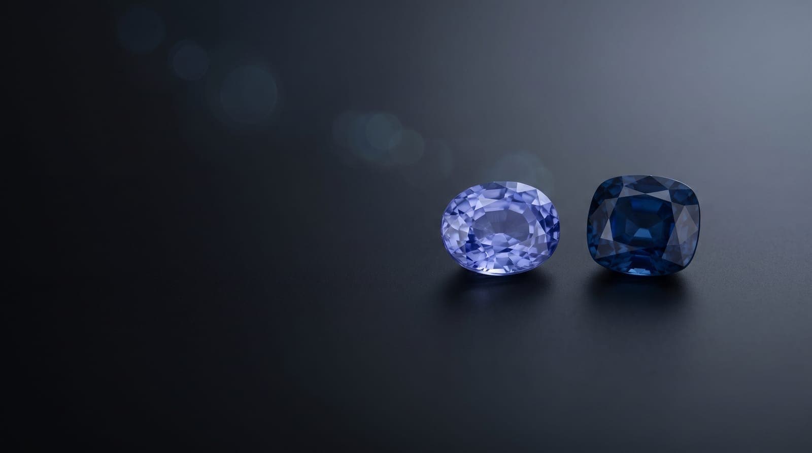 Side-by-side comparison of a Ceylon sapphire and Thai sapphire under gemological lighting