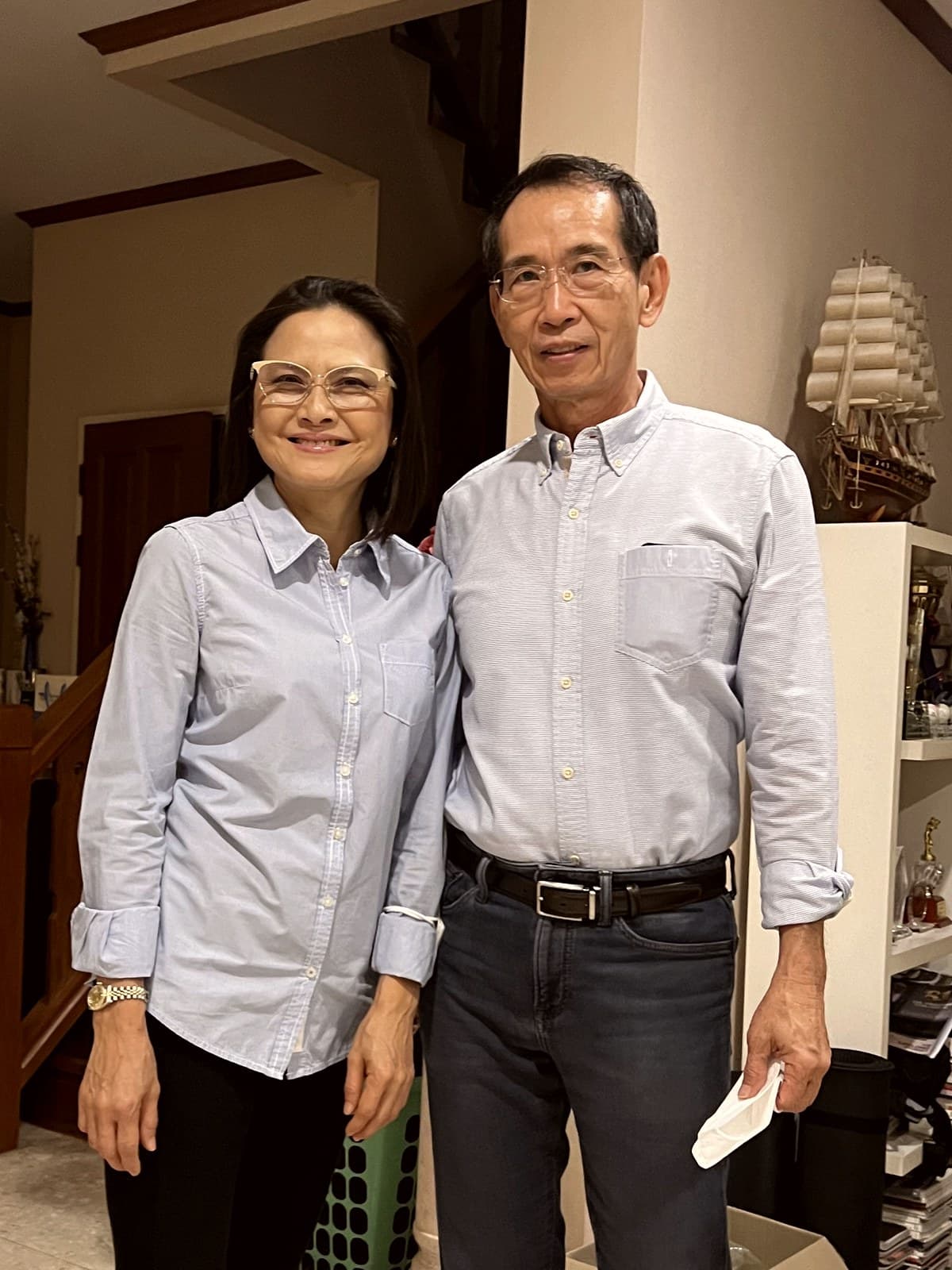 Chanon Trakulmechokchai, founder of Lim Gems Factory, with his wife at their family home in Bangkok